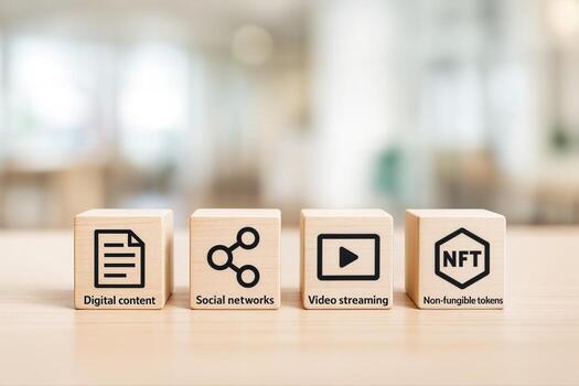 Digital Trends Overview with Wooden Blocks Displaying Icons of Digital Content, Social Networks, Streaming, and Non Fungible Tokens on a Blurred Background photo