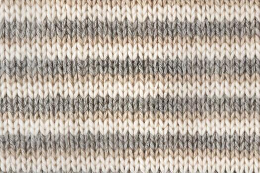 Closeup of Cozy Knit Textures in Striped Beige and Gray Pattern Creating a Warm and Soft Fabric Background for Home Decor or Fashion Projects photo