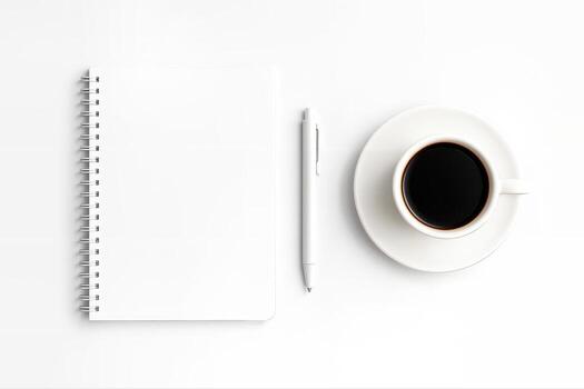 Minimalist Flatlay Featuring a Clean Desk Setup with a Notebook, Pen, and Coffee Cup on a White Surface with a Simple and Elegant Composition photo