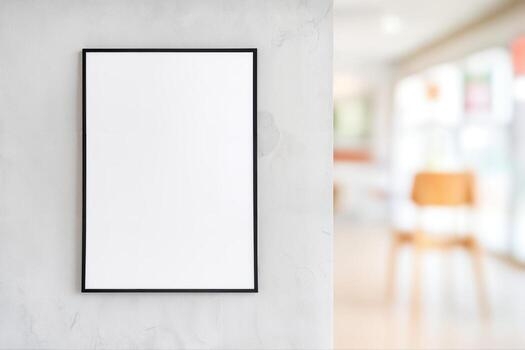 Minimalist Studio Setting Featuring a White Framed Canvas Hung on a Textured Wall in a Brightly Lit Modern Space With Shallow Depth of Field photo