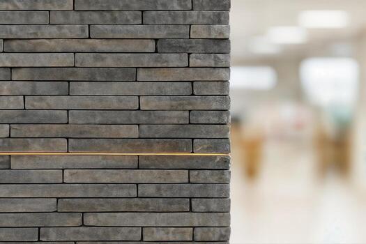 Stone Facade With Bronze Accent In An Indoor Setting Featuring A Detailed Closeup Focus On The Texture Of The Material With A Blurred Background photo