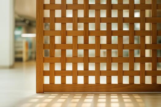 Cane Patterned Timber Wall Illuminated by Natural Light in a Modern Indoor Setting with Geometric Shadow Play on the Floor photo