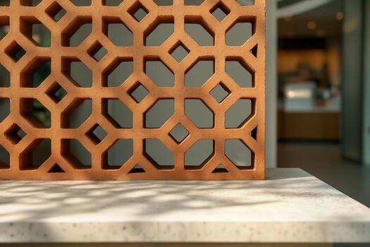 Clay Breeze Block Design In A Modern Indoor Setting With Natural Light And Soft Shadows Creating A Geometric Pattern On A Marble Surface photo