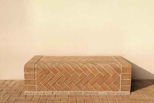 Herringbone Patterned Clay Bench In Minimalist Outdoor Setting With Natural Light And Simple Geometry Emphasizing Earthy Tones And Texture photo