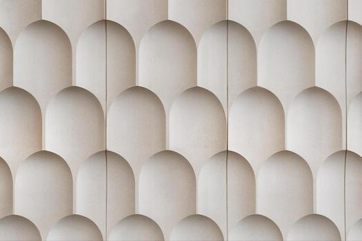 Stone Facade Featuring Scallop Designs in a Repetitive Pattern for Architectural Ornamentation, Highlighting Texture and Depth in a Minimalist Style photo