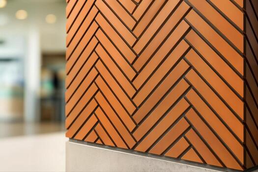 Terracotta Chevron Design On Indoor Wall With Soft Ambient Light And Blurred Background Creating A Stylish And Modern Architectural Element photo