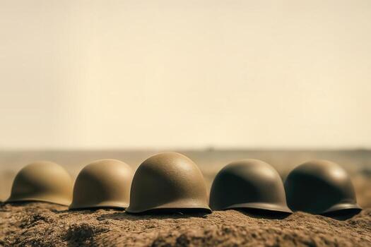 Battlefield Ridge Displaying Military Helmets in a Row on Sandy Terrain Under Clear Sky with Warm Lighting and Natural Texture photo