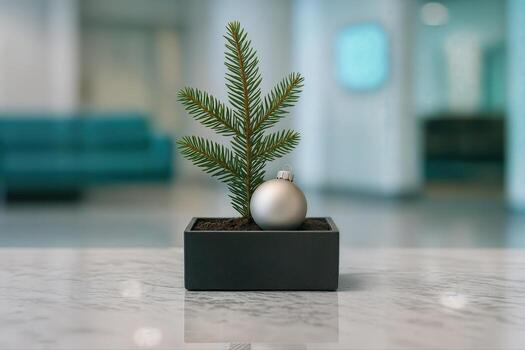 Elegant Lobby Planter Displaying a Small Pine Tree in a Black Pot with a Silver Ornament on a Polished Marble Surface in a Modern Lobby Interior photo