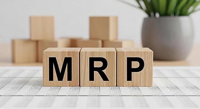 Wooden blocks displaying MRP on a financial document in a bright office symbolizing material requirements planning and efficient inventory management for a successful manufacturing process photo