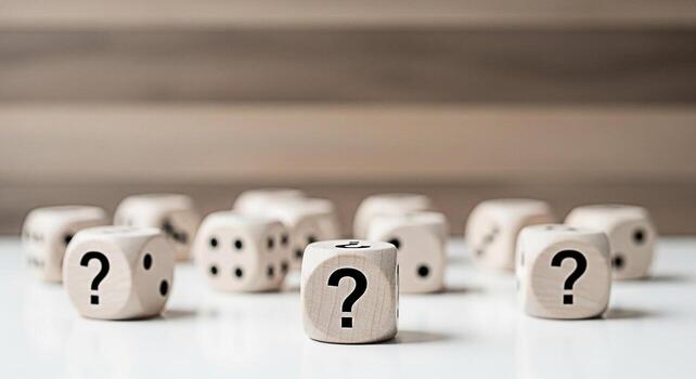 Wooden dice displaying question marks on a white surface representing uncertainty and decisionmaking in a business context creating a sense of mystery and challenge for strategic planning and problems photo