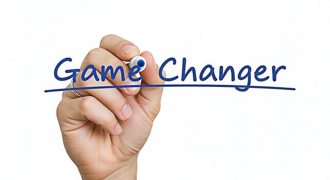 Closeup of a hand writing Game Changer on a clear surface with a blue marker symbolizing innovation and a transformative approach in a bright minimalist setting conveying a sense of progress and new b photo