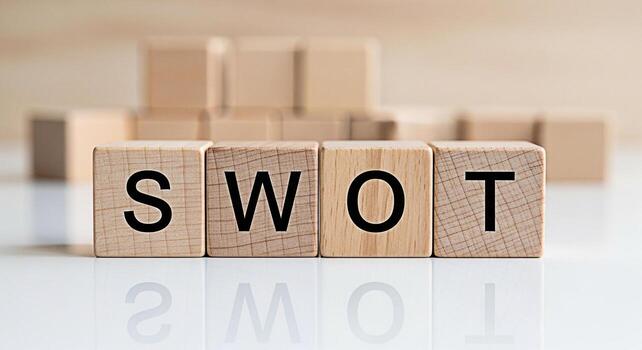 Wooden blocks displaying SWOT analysis on a white surface in a bright studio setting symbolizing strategic planning and business development for growth and success photo