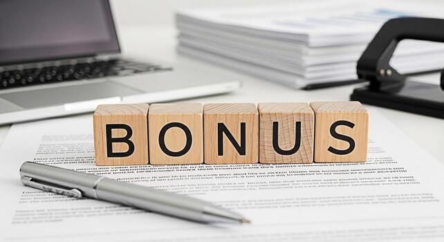 Closeup of a laptop and stack of documents on a white desk in a modern office representing productivity and organization in a professional workspace fostering a sense of efficiency and focus photo