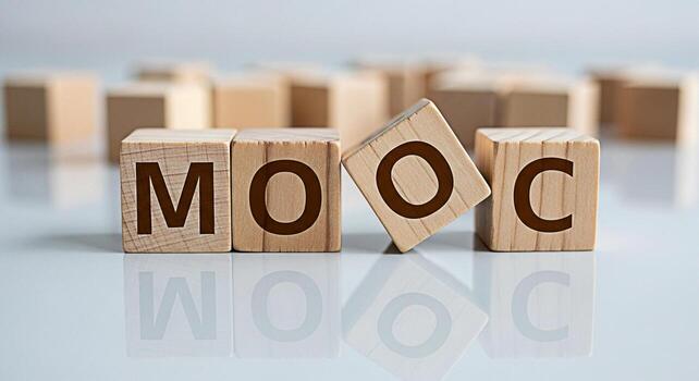 Wooden blocks spelling MOOC on a reflective surface representing modern online education and elearning creating a bright and hopeful atmosphere for accessible knowledge and skill development photo