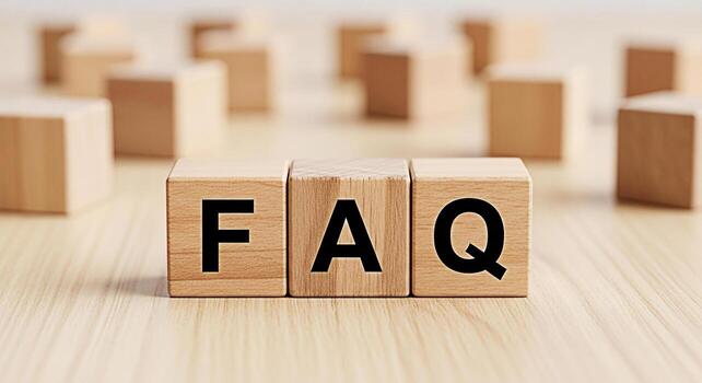 Wooden blocks displaying FAQ on a wooden surface representing frequently asked questions and providing easy access to information and support creating a helpful and informative atmosphere photo