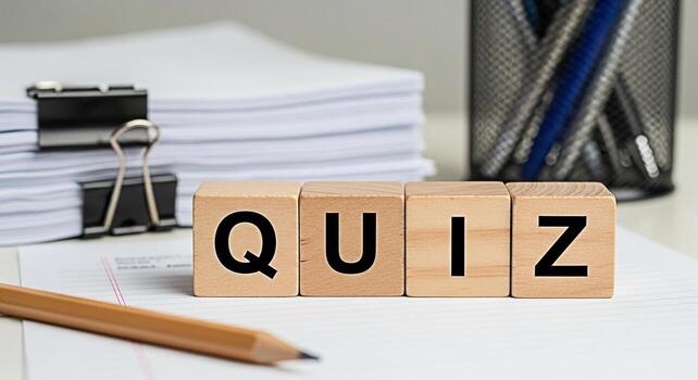 Wooden blocks spelling QUIZ on a desk with a pencil and stack of papers creating a learning and educational atmosphere for testing knowledge and skills photo