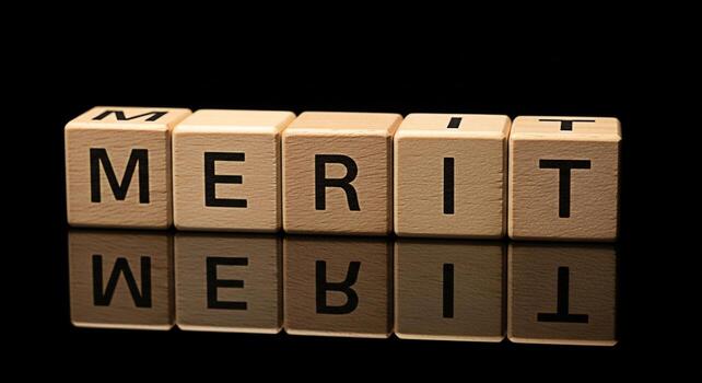 Wooden blocks spelling MERIT on a reflective black surface symbolizing achievement and success through hard work and talent creating a mood of aspiration and recognition in a professional setting photo