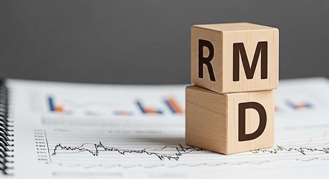 Wooden blocks displaying RMD resting on a financial chart in a corporate setting symbolizing risk management and data analysis for strategic decisionmaking and investment planning photo