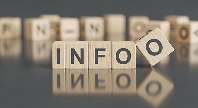 Wooden blocks spelling INFO on a reflective surface conveying a message of knowledge and data in a clean minimalist setting suggesting clarity and accessibility of information photo