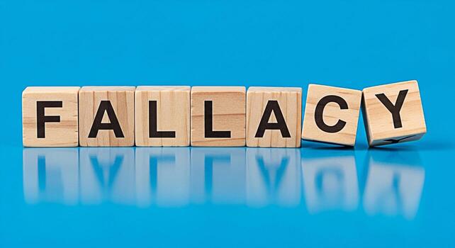 Wooden blocks spelling FALLACY on a blue surface representing a flawed argument or misconception conveying the concept of logical errors and critical thinking in a bright and reflective environment photo