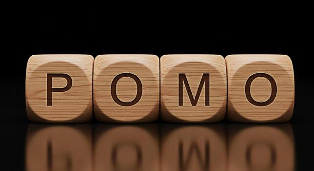 Wooden blocks spelling POMO reflecting on a black surface symbolizing a modern approach to productivity and time management promoting focus and efficiency in a sleek and minimalist setting photo