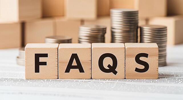 Wooden blocks spelling FAQs on a white surface with stacks of coins and wooden blocks in the background representing financial questions and answers conveying a sense of clarity and information photo