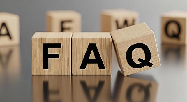 Wooden blocks spelling FAQ on a reflective surface representing frequently asked questions and information seeking in a clear and concise manner conveying a sense of knowledge and support photo