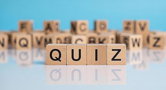 Wooden blocks spelling QUIZ on a reflective surface against a blue background representing knowledge testing and intellectual challenge in an educational setting creating a mood of curiosity and engag photo