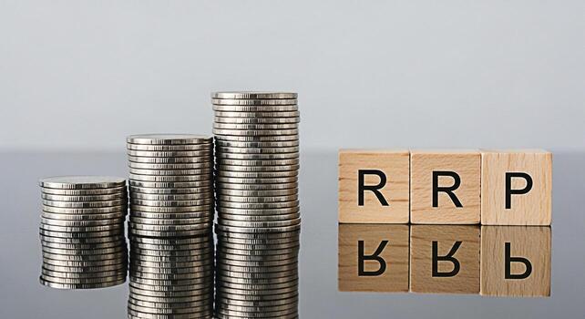 Stacks of coins and wooden blocks spelling RRP on a reflective surface representing financial planning and investment strategies for retirement emphasizing growth and stability in a minimalist setting photo