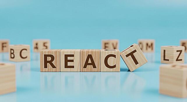 Wooden blocks spelling REACT on a blue surface one block tilting symbolizing the dynamic nature of React a popular JavaScript library for building user interfaces conveying innovation and modern web d photo