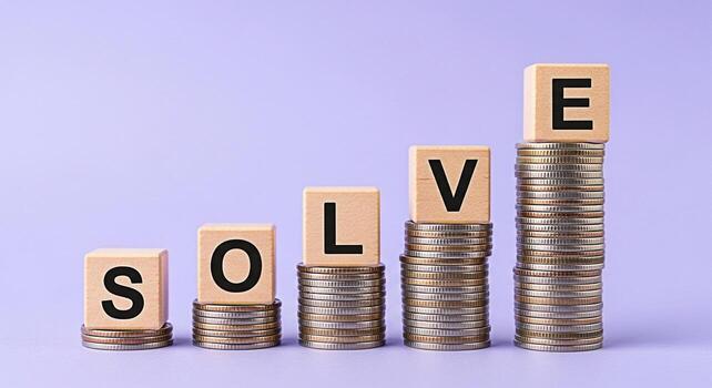 Wooden blocks spelling SOLVE are stacked atop increasing piles of coins symbolizing problemsolving and financial growth in a business context set against a clean light purple background conveying a se photo