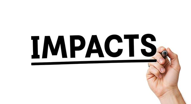 Hand underlining the word Impacts on a whiteboard symbolizing the significance and consequences of actions and decisions in a business or personal context emphasizing accountability and responsibility photo