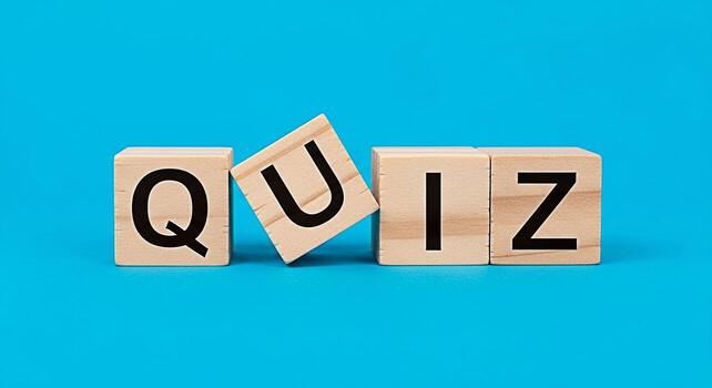Wooden blocks spelling QUIZ on a bright blue background representing a fun and engaging educational challenge perfect for testing knowledge and promoting learning in a playful environment photo