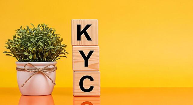 Wooden blocks spelling KYC on a vibrant yellow background symbolizing the importance of Know Your Customer compliance in a secure and trustworthy business environment promoting transparency and custom photo