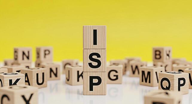 Wooden blocks spelling out ISP standing tall among other alphabet blocks on a bright yellow background symbolizing internet service provider connectivity and the importance of choosing the right provi photo