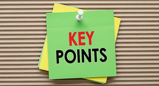 Pinned green sticky note displaying Key Points on a corrugated cardboard background emphasizing essential information and strategic planning for business success and effective communication photo