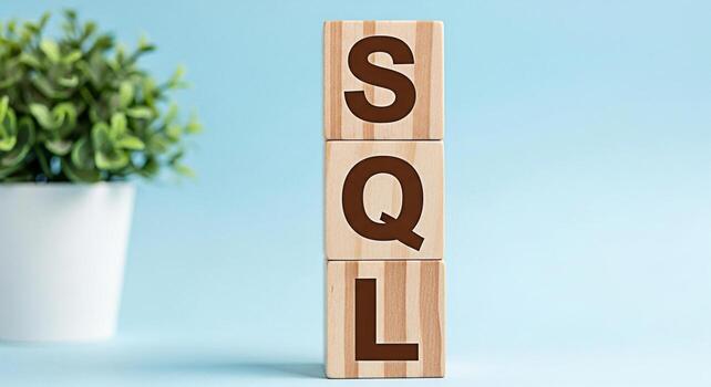 Wooden blocks spelling SQL stacked against a light blue background in a studio setting representing database management and structured query language for data retrieval and manipulation conveying clar photo
