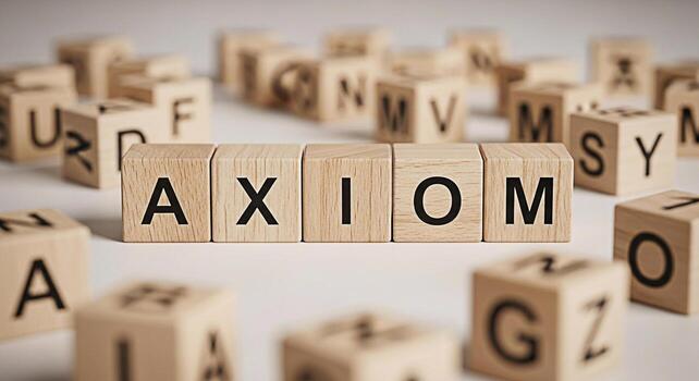 Wooden blocks spelling out Axiom on a white surface surrounded by other lettered blocks representing a fundamental truth and serving as a foundational concept for logical reasoning and problemsolving photo