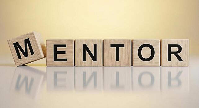 Wooden blocks spelling out MENTOR on a reflective surface against a soft yellow backdrop symbolizing guidance support and the importance of mentorship in professional and personal development creating photo