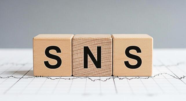 Wooden blocks displaying SNS on a financial chart background symbolizing social networking services and their impact on market trends conveying a message of connection data analysis and modern communi photo