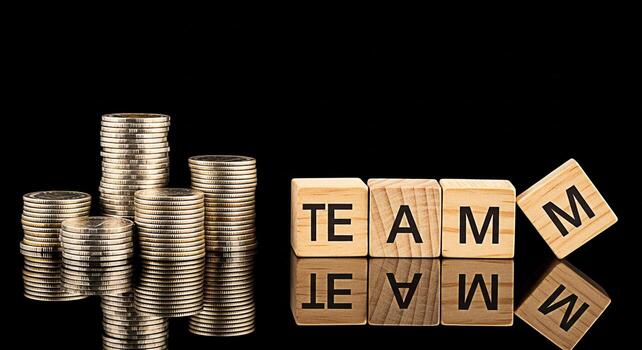 pilas de monedas y de madera bloques ortografía equipo en un reflexivo negro superficie simbolizando trabajo en equipo colaboración y financiero éxito en un negocio ambiente transporte un mensaje de unidad y Prospe foto