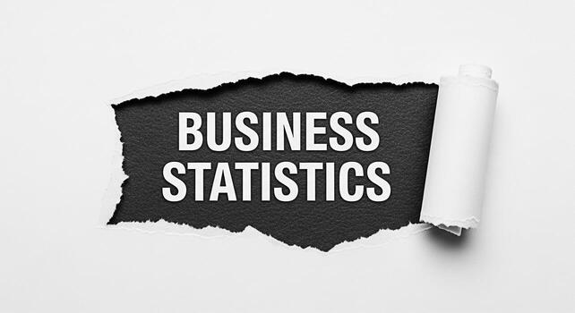 Revealing business statistics through a torn paper highlighting data analysis and strategic planning in a modern minimalist setting conveying a sense of discovery and insightful decisionmaking photo