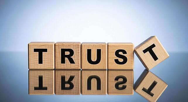 de madera bloques ortografía confiar en un reflexivo superficie con uno bloquear que cae simbolizando el fragilidad de confiar en un negocio ajuste transporte un concepto de riesgo vulnerabilidad y el importancia de mai foto