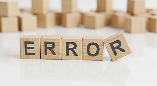 Wooden blocks spelling ERROR on a white reflective surface symbolizing a system failure and the need for troubleshooting and problemsolving in a clean minimalist environment evoking a sense of urgency photo
