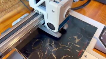 3d printer creating object layer by layer with extruder moving video
