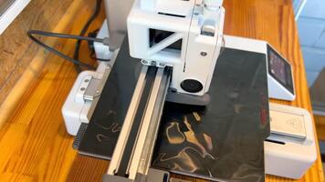 3d printer creating red plastic object layer by layer video