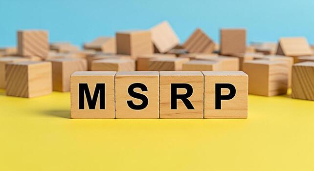 Wooden blocks displaying MSRP on a vibrant yellow surface against a soft blue backdrop symbolizing transparency and clarity in pricing strategies for retail and business promoting trust and informed c photo