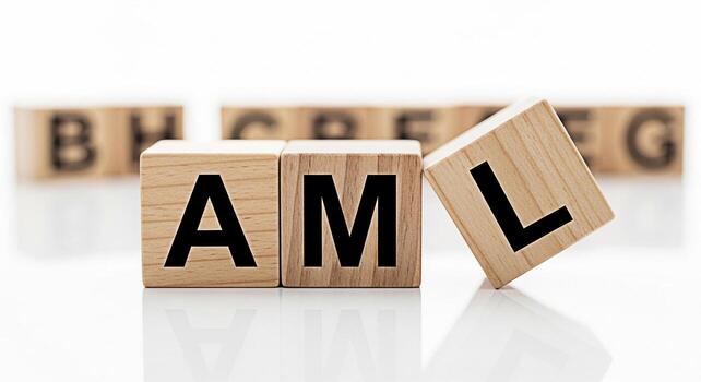 Wooden blocks spelling AML on a reflective white surface representing AntiMoney Laundering compliance and regulatory framework conveying a sense of financial security and transparency in a clean minim photo