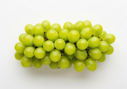 Fresh cluster of vibrant green grapes studio shot on a clean white background. photo