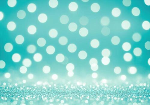 Bright aqua bokeh lights and shimmering glitter texture for festive background photo